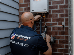 HomeFirst technician inspecting home heating and cooling equipment