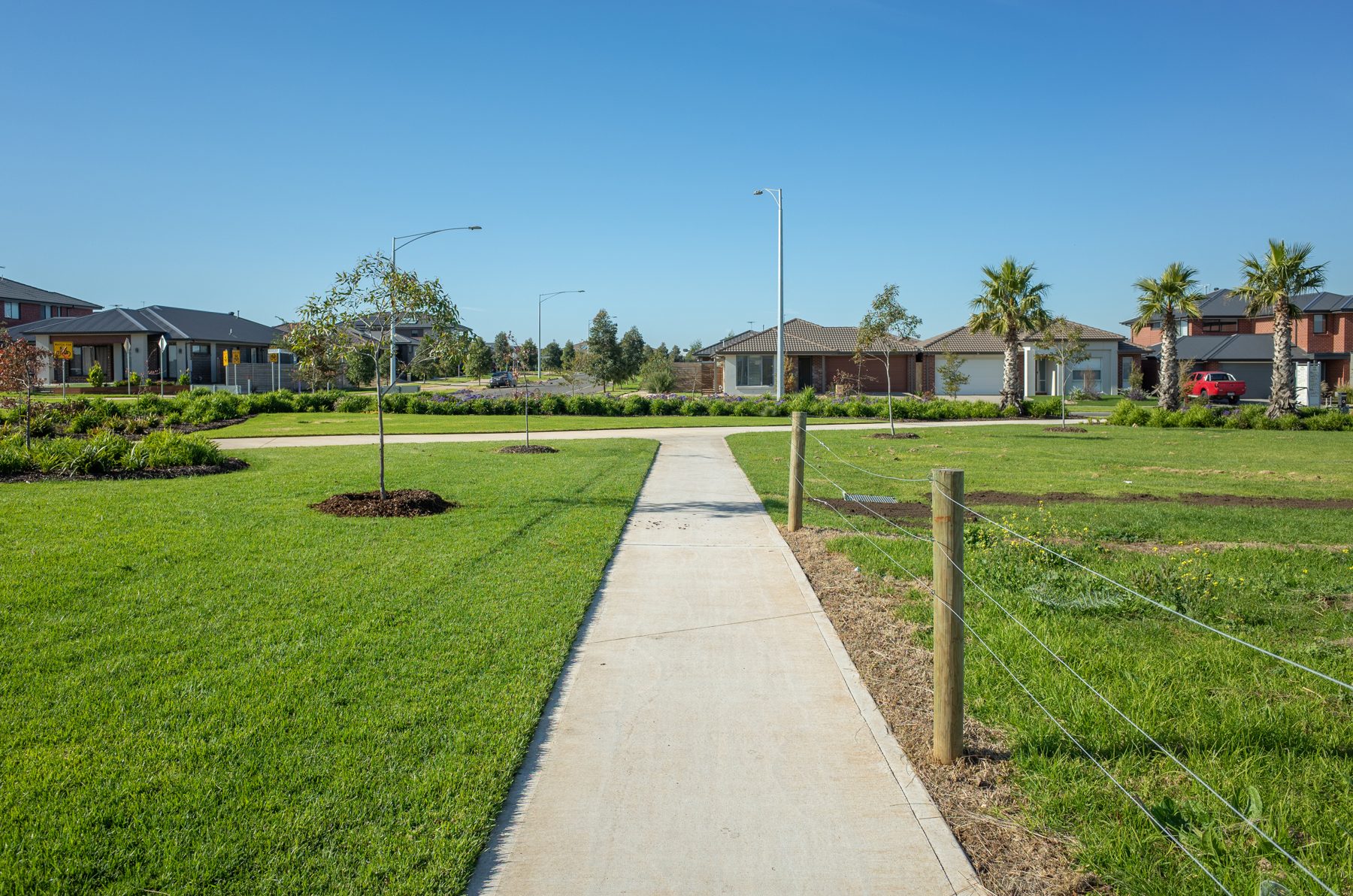 Footpath leading to modern homes in a Melbourne suburb